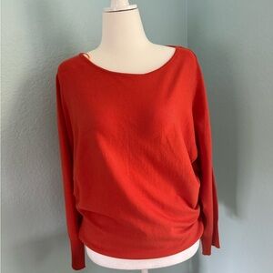Cinnamon orange soft sweater.  Only worn once